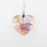 Heart Shaped Pendant with Hair and Flowers