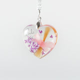 Heart Shaped Pendant with Hair and Flowers