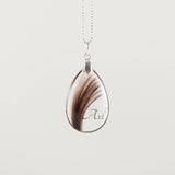 Beautiful Teardrop Pendant with Hair